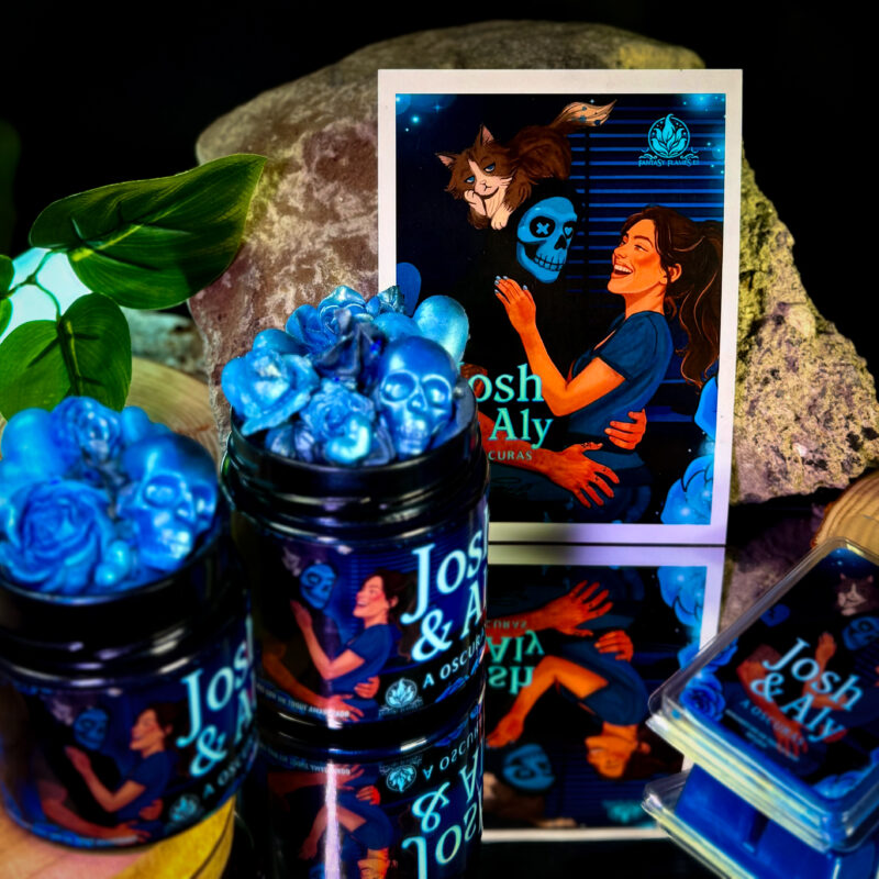 Vela literaria A oscuras de Navessa Allen, edición especial en caja literaria con tarro nacarado dark blue y frosting decorado.